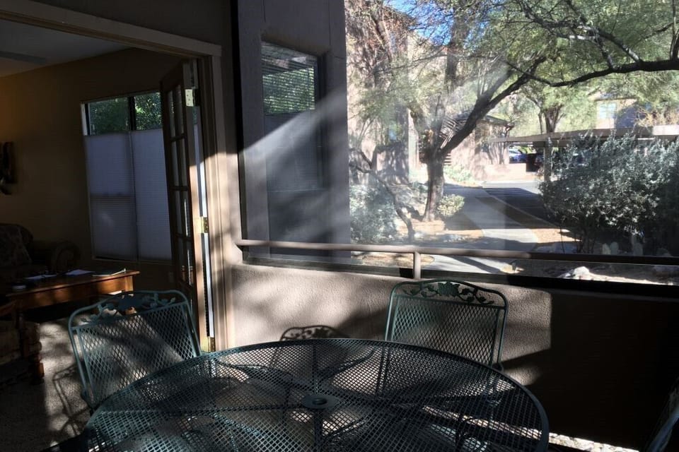 Screened in porch to take in the sites and sounds of the desert mountains