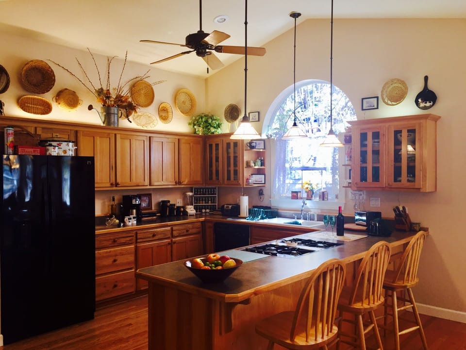 Kitchen - hickory cabinetry, gas stove, frig w/ice maker & cold water dispenser