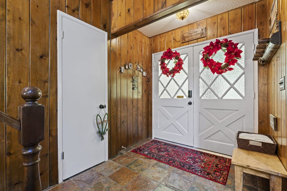 Entry way with guest slippers, and a closet to hang your jackets and coats.