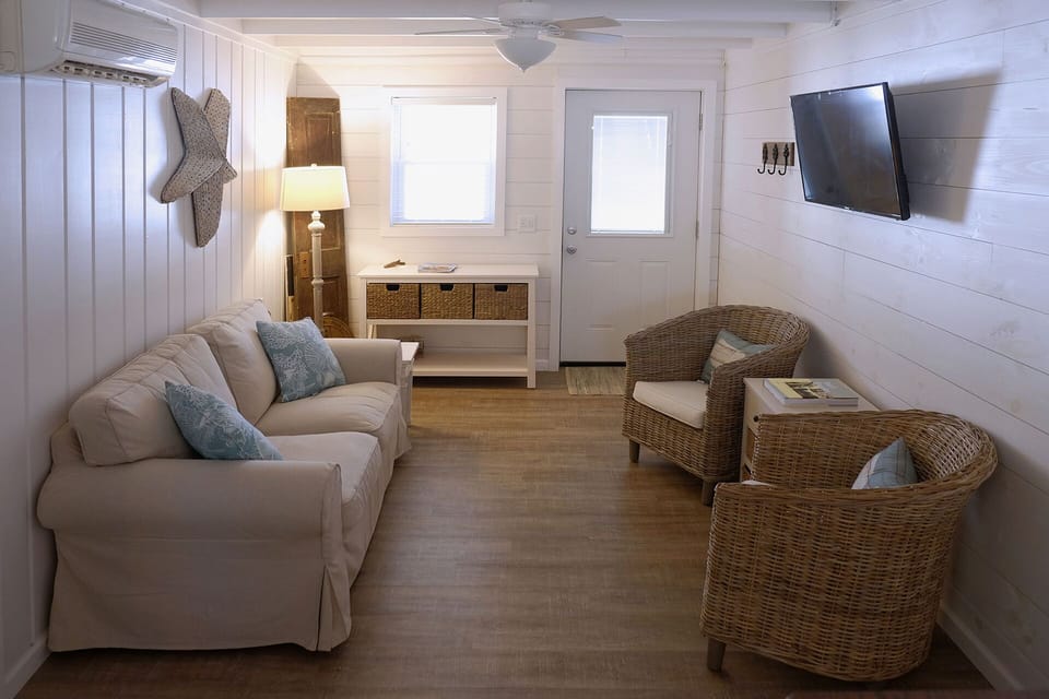 Cozy living room right off the screened porch