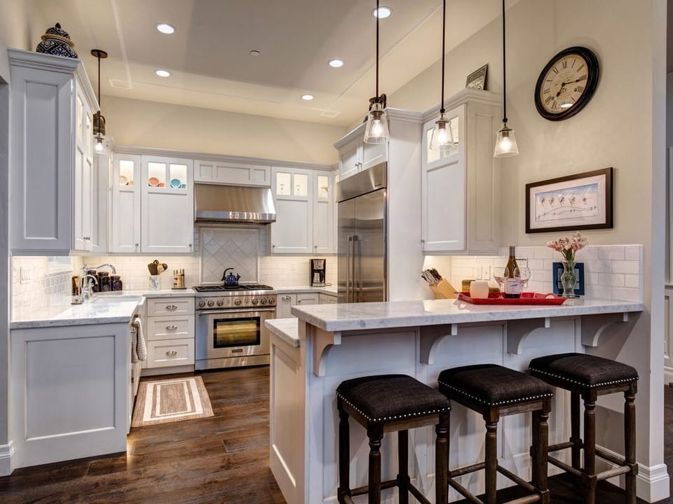 Eat-in Gourmet Kitchen - marble counter tops, high end fixtures