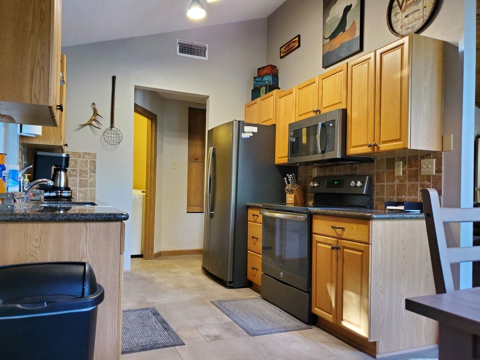 Kitchen features modern appliances