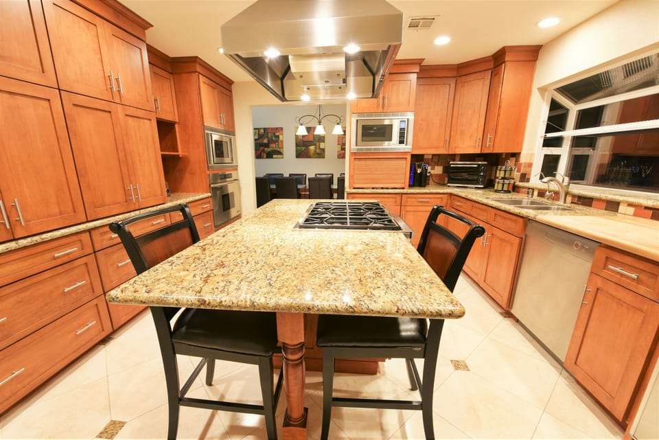 Gourmet Kitchen with custom cabinetry, professional built-in  appliances,