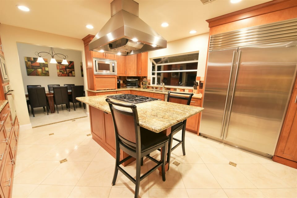 Subzero Fridge, 6-burner Dacor Cooktop w/ hood, large Dacor Oven, 2 Microwaves
