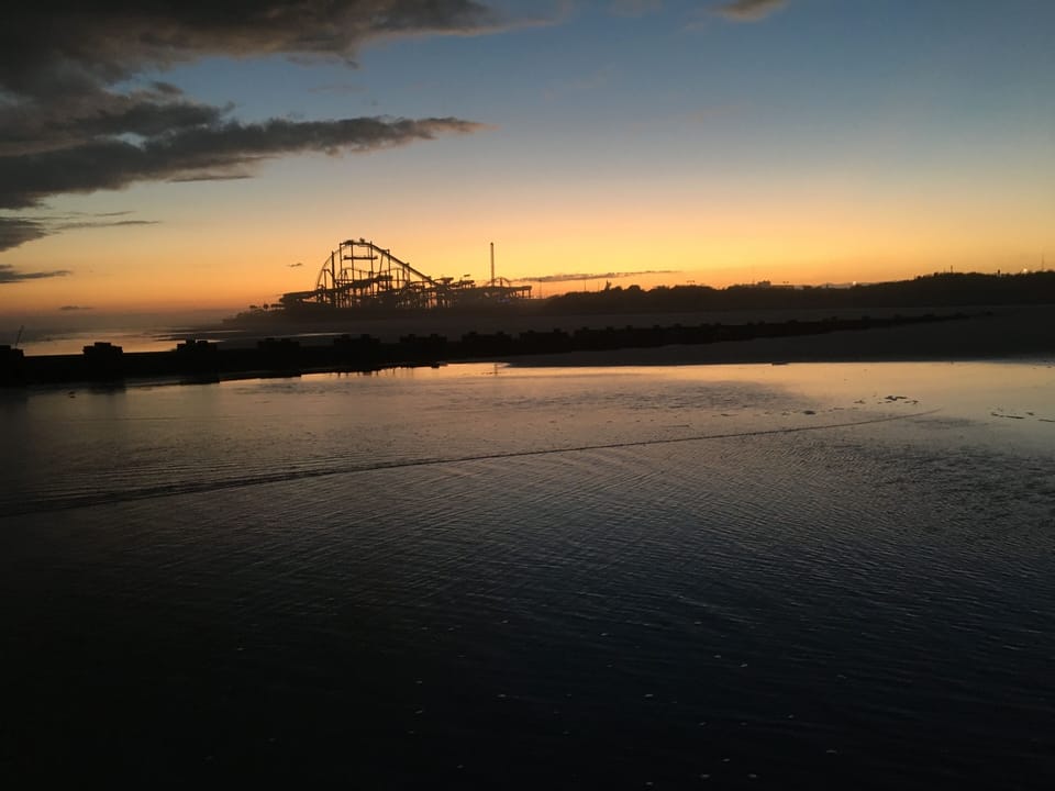 Nothing better than watching the sunset over the pier on the beach.