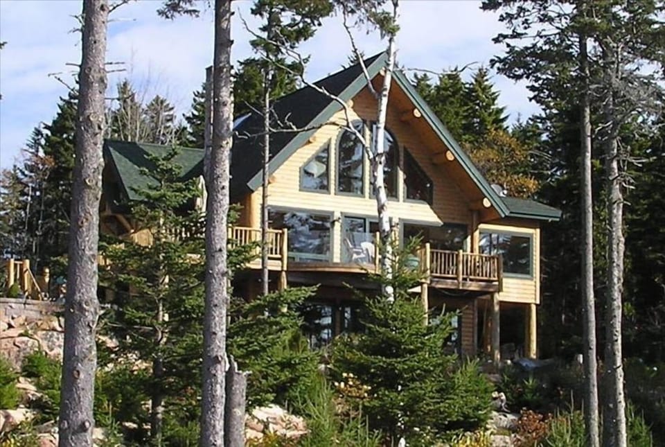 Windows offer scenic, ocean views from the front of the house facing the bay