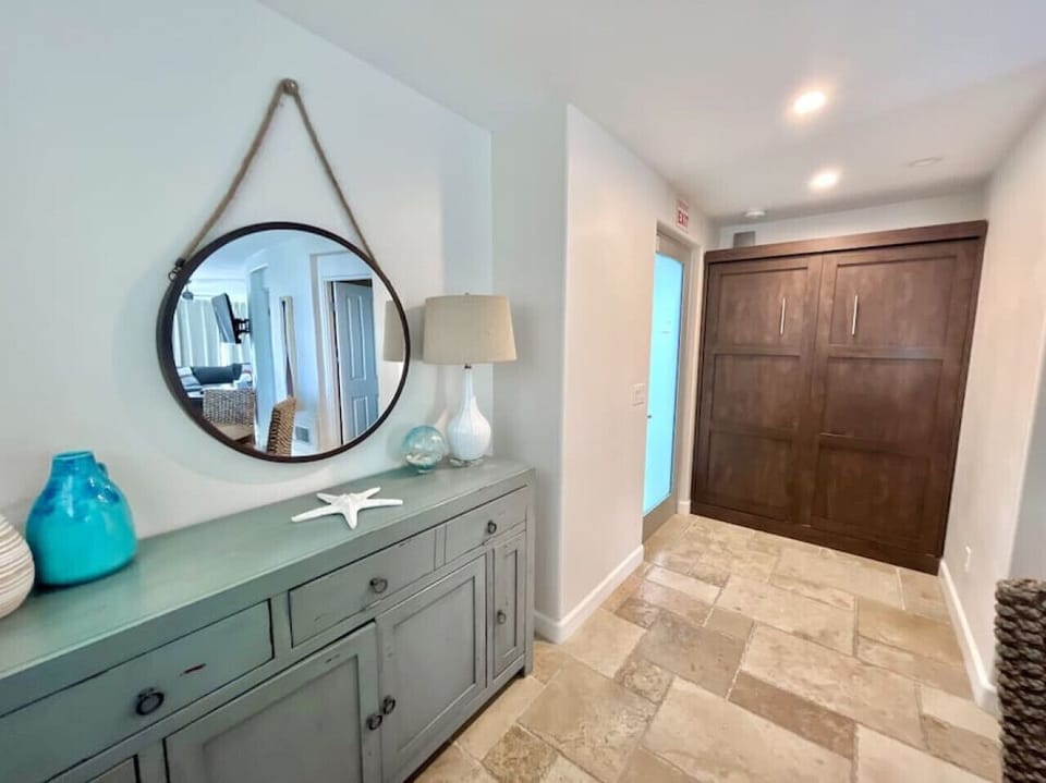 The full size murphy bed is just off the dining area