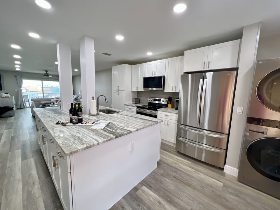 Open, Airy & Fully equipped kitchen for all of your entertaining & dining needs.