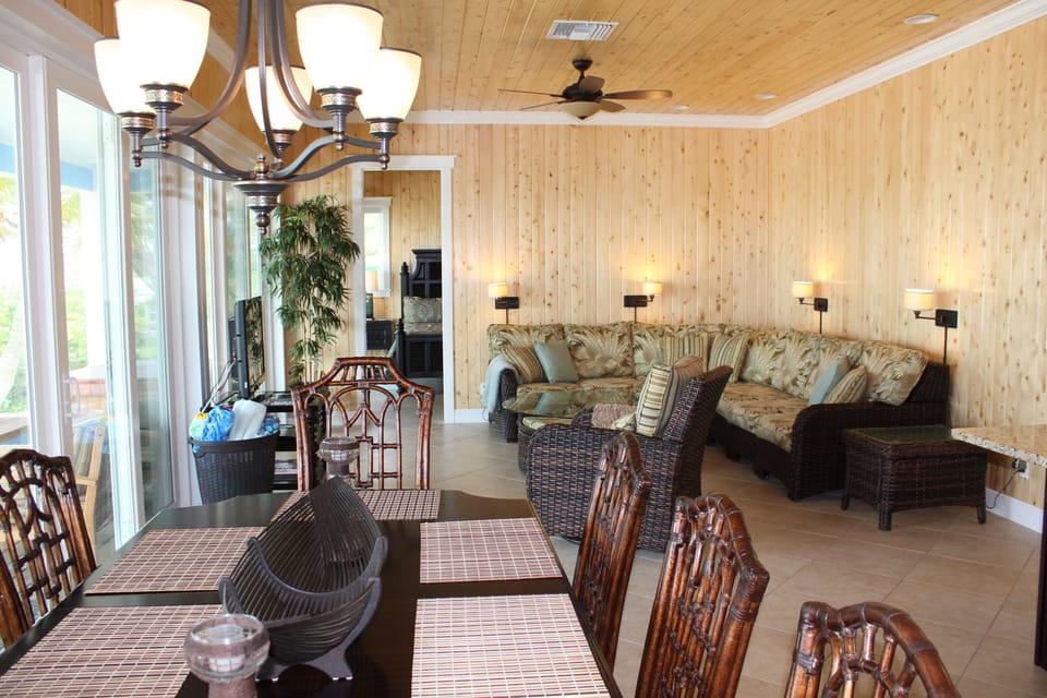 GREAT room!  Seating for 8+ rolling ottomans to seat 4 more - for games, etc.