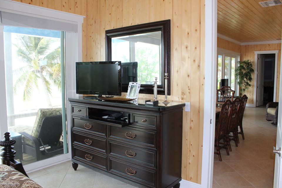 East Master - looking toward 'great room' - a wall of windows facing the ocean.