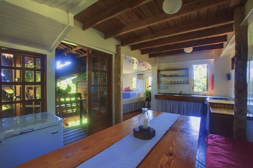 Studio bedroom floor with dining area and kitchen.