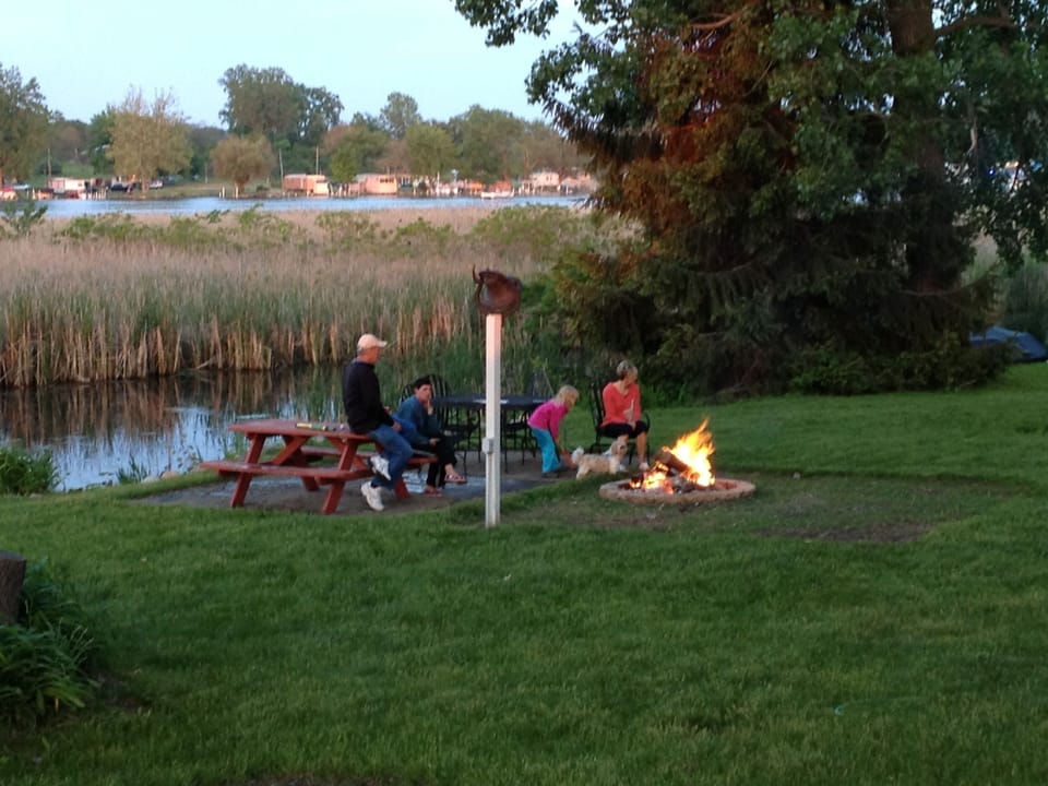 Campfire in the back yard with plenty of seating.