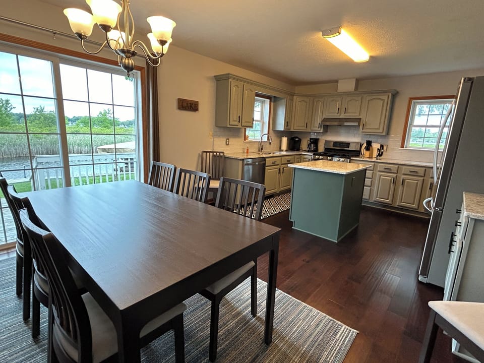 Open floorplan with view of dining room and recently remodeled kitchen.