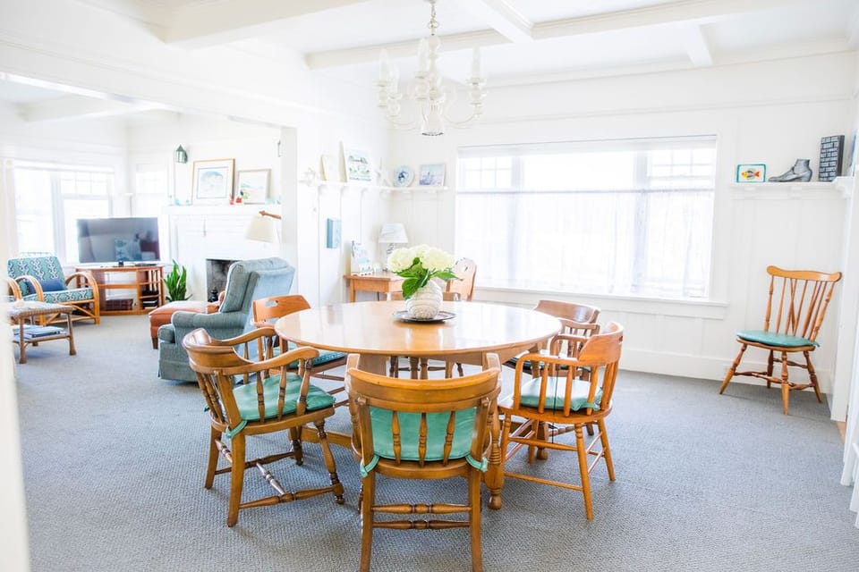 Dining room table expands to seat 10