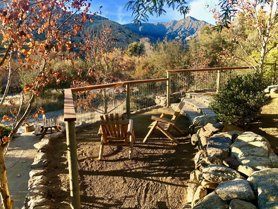 The terrace off the back deck looking out over the river