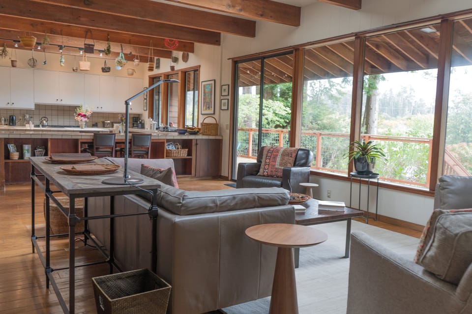 Our living room & kitchen face our South facing deck & orchard beyond!