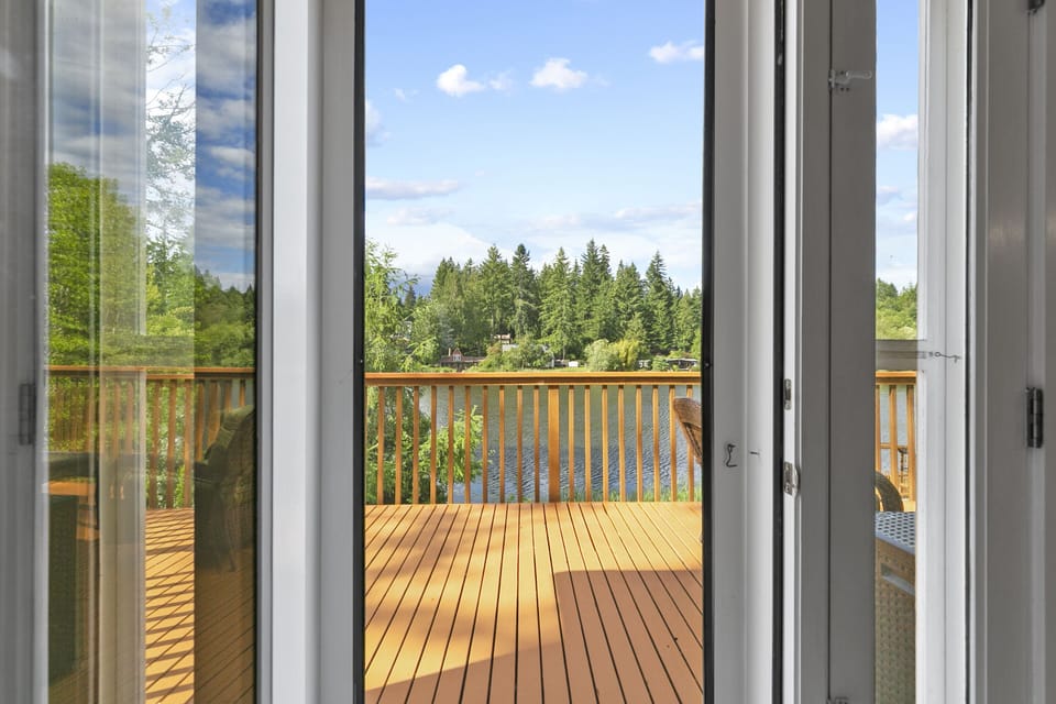 The primary bedroom has private access to the deck.
