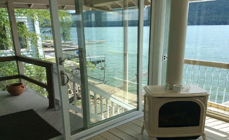 The gas stove warms the sleeping porch on chilly mornings.
