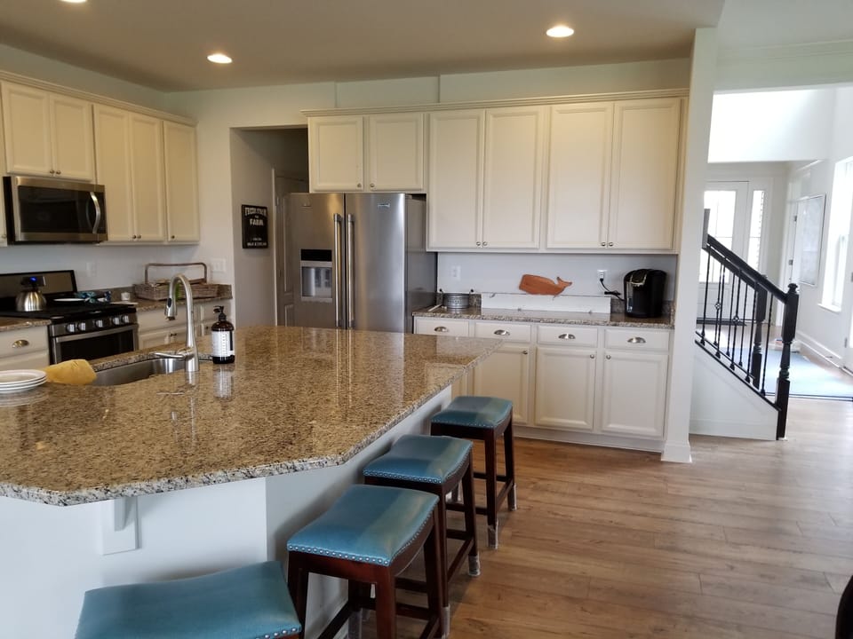 Kitchen - new frig has arrived.  Black frig moved to garage