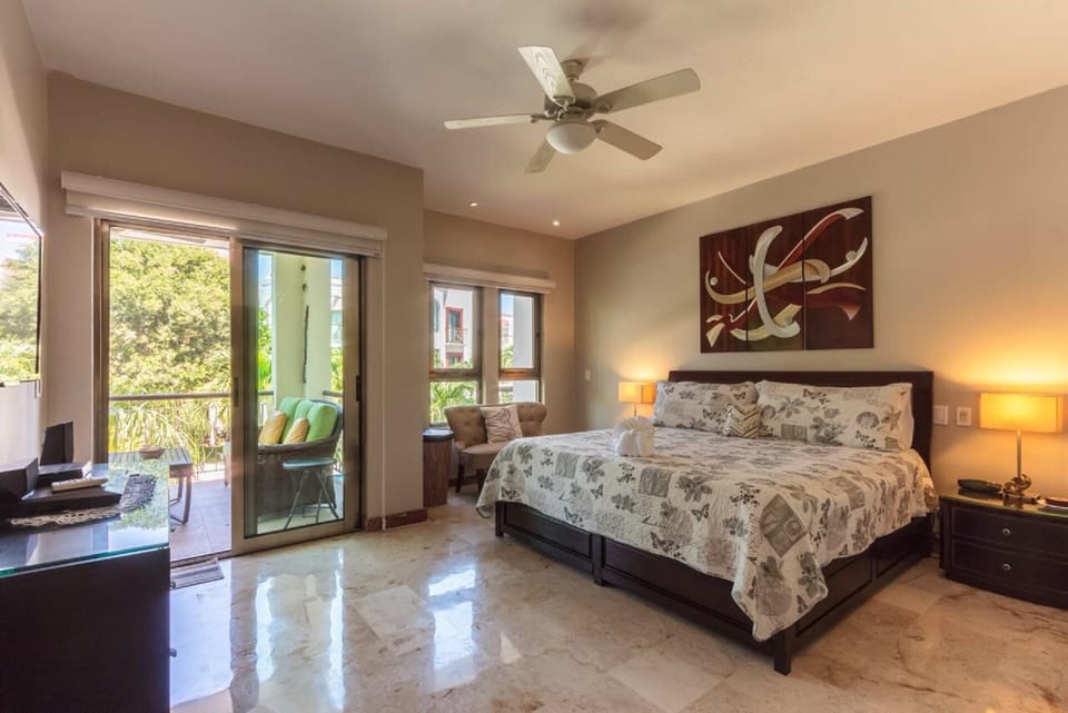 Master Bedroom with access to balcony, smart TV and surround sound
