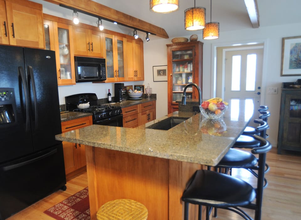 Kitchen view showing the front door 
