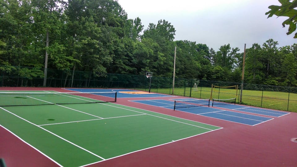 Tennis, Pickleball, Basketball & Volleyball Courts are right by the house