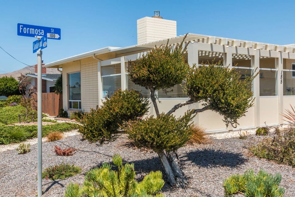 This home is located on the corner just two short blocks to the beach