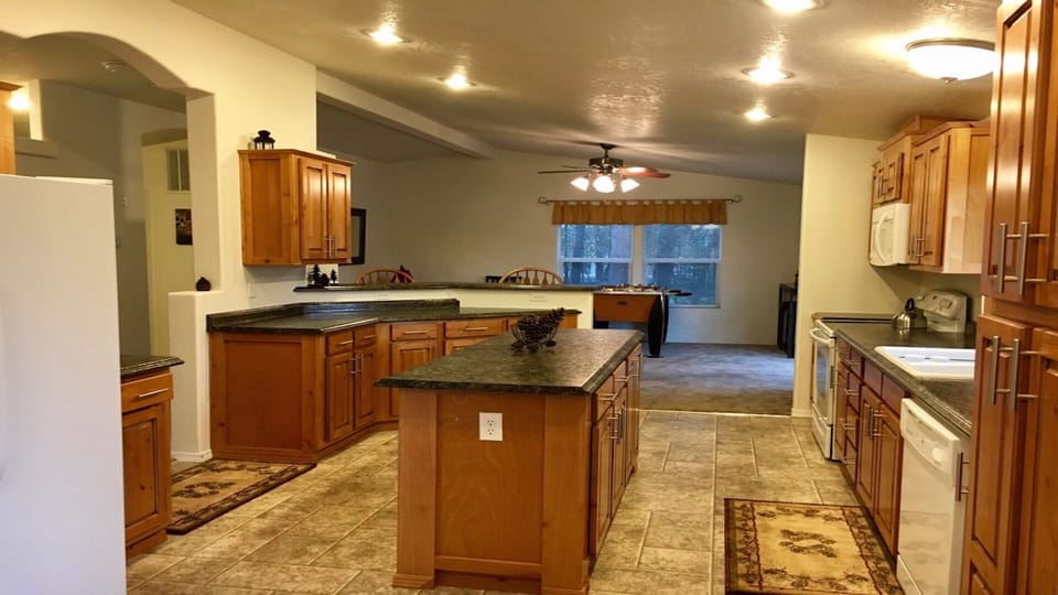 Large Kitchen w/island. Flat top stove, microwave, dishwasher and refrigerator
