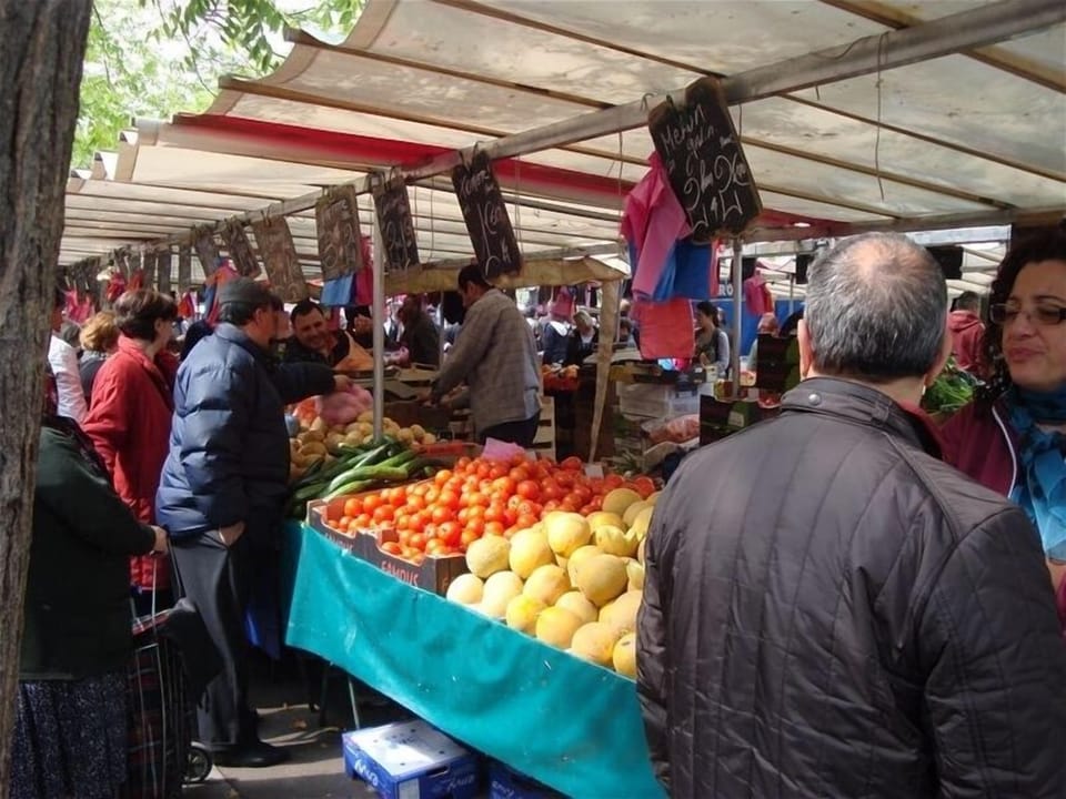 Shop like the locals at the farmer's market accross street