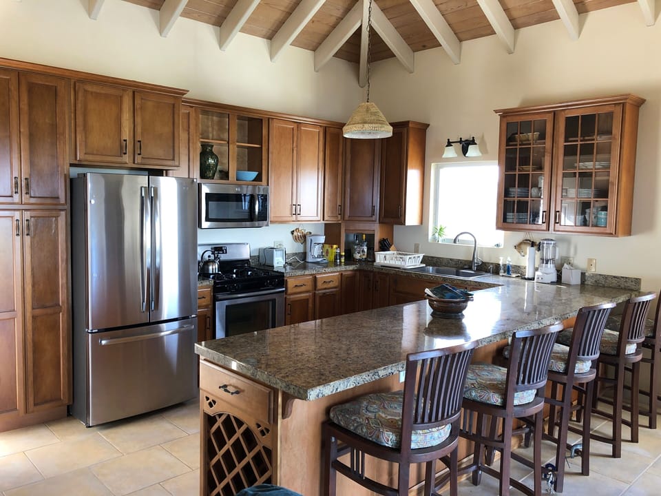 Well-equipped kitchen with new stainless appliances