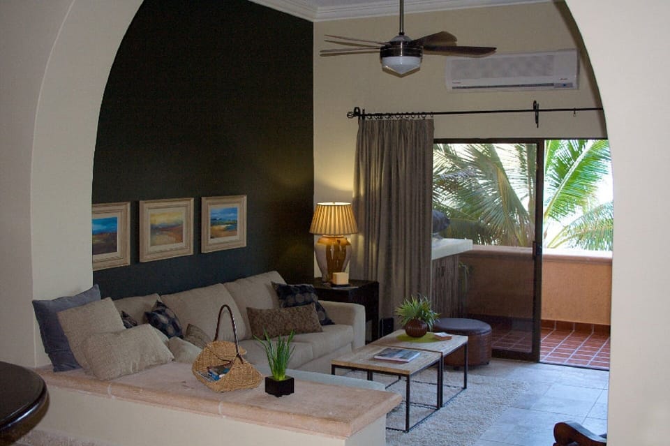 Sunken living room with high ceilings