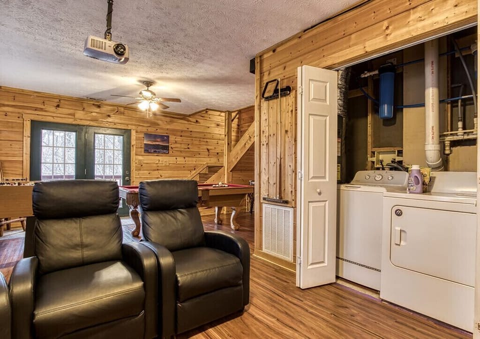 Washer and dryer in game room area (bottom level) 