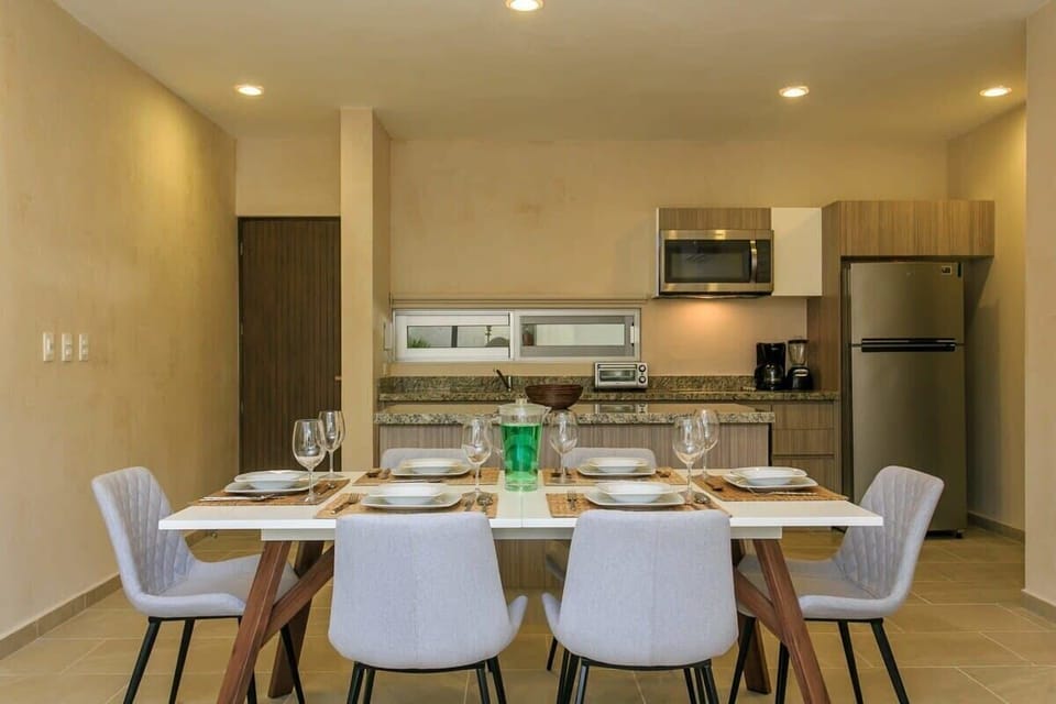 Another view of dining & equipped kitchen area