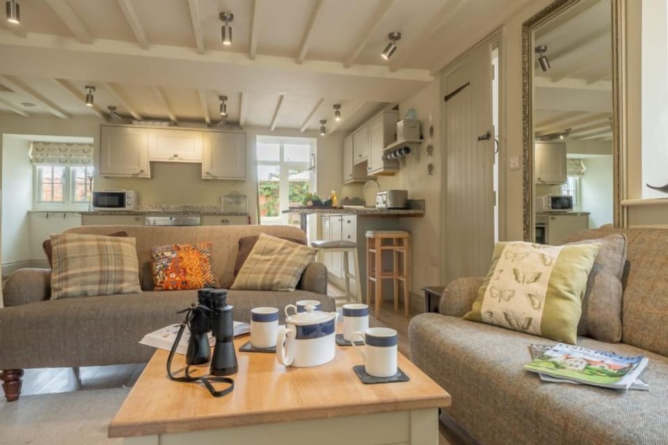 Ground floor: The sitting room with kitchen beyond