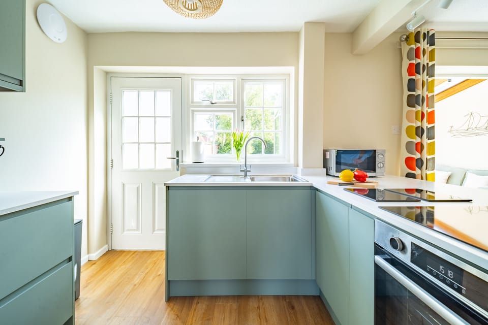 Ground floor: Well-equipped kitchen with access to outdoors
