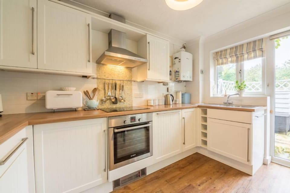 Ground floor: The kitchen has french doors to the garden