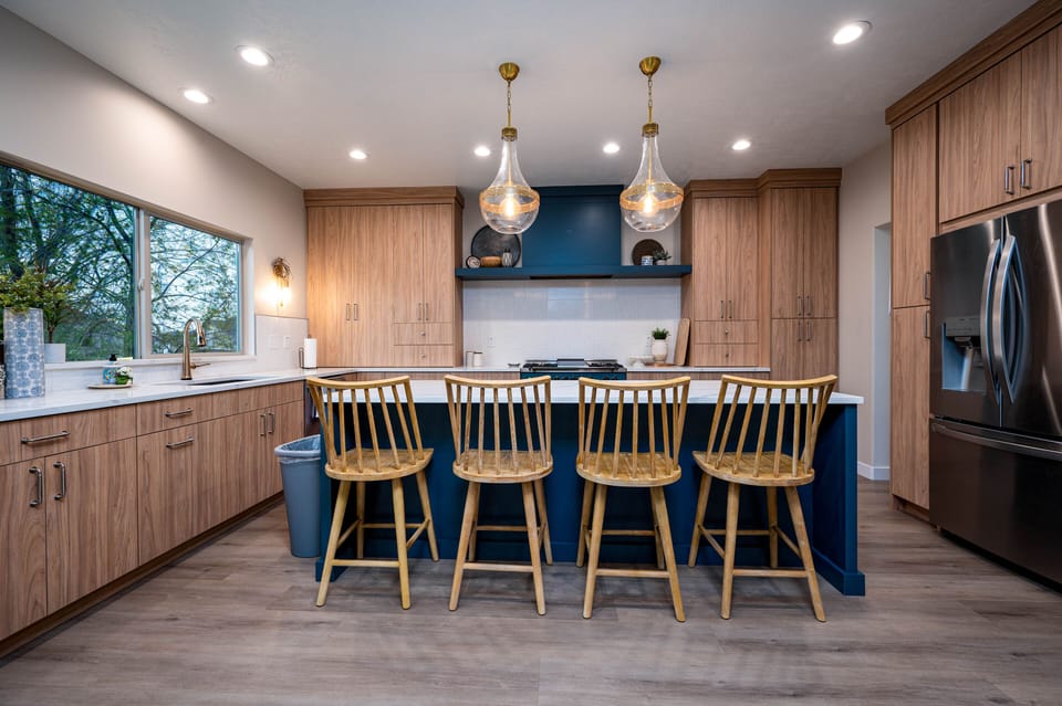 Fully stocked modern kitchen w/ butlers panty. 