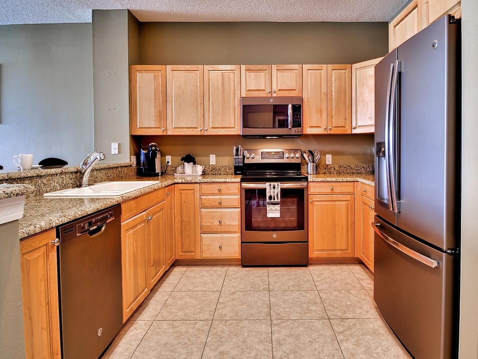 Kitchen has granite counter tops and all the conveniences of home.