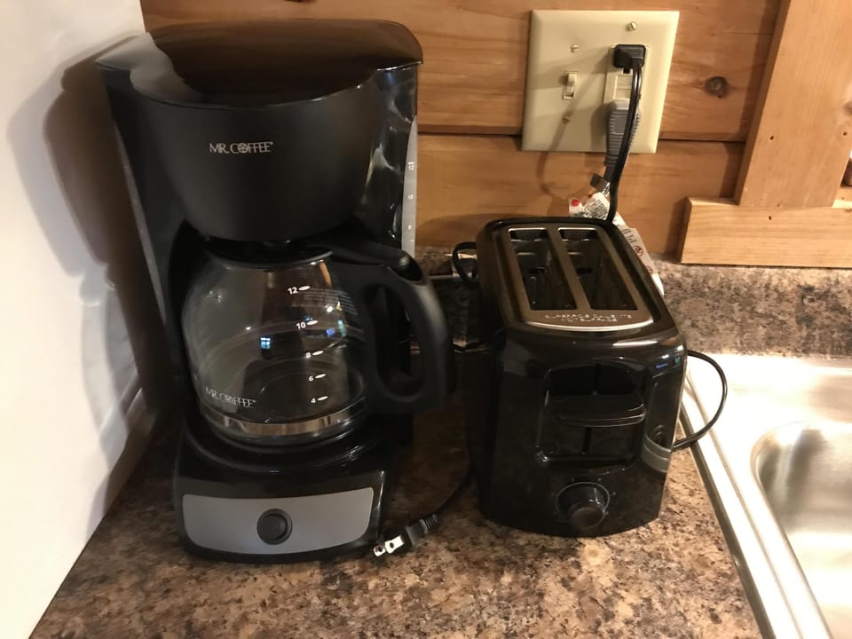 Cozy kitchen corner with coffee maker and toaster for easy mornings