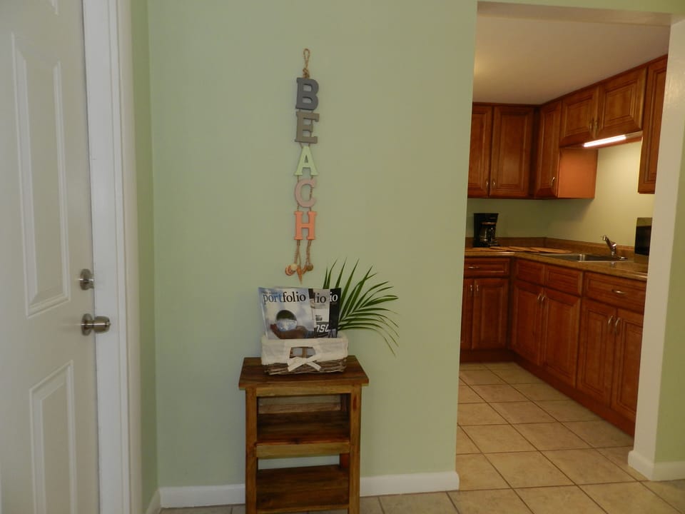 "Seafoam" green apartment entryway