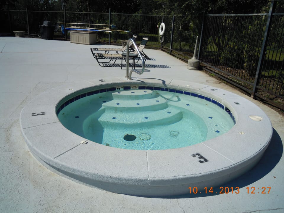 Jacuzzi in pool area.  Code required for entry.