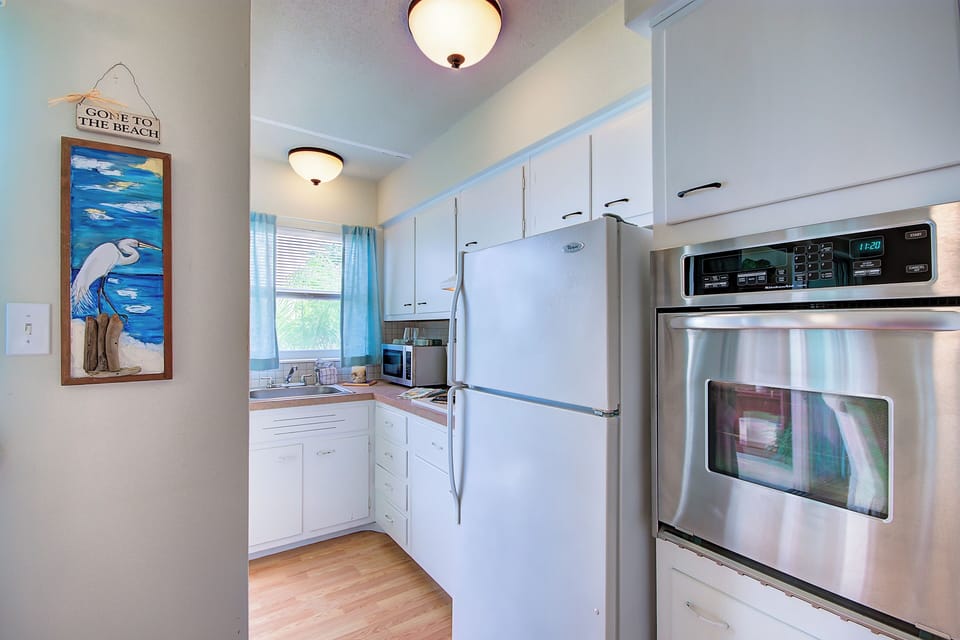 Essentials: Features a full-size fridge, stove, oven, microwave, and coffee maker.