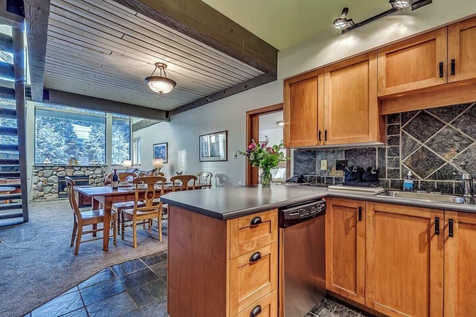 Kitchen View to Dining and Living Area - Greystone Lodge Unit 401