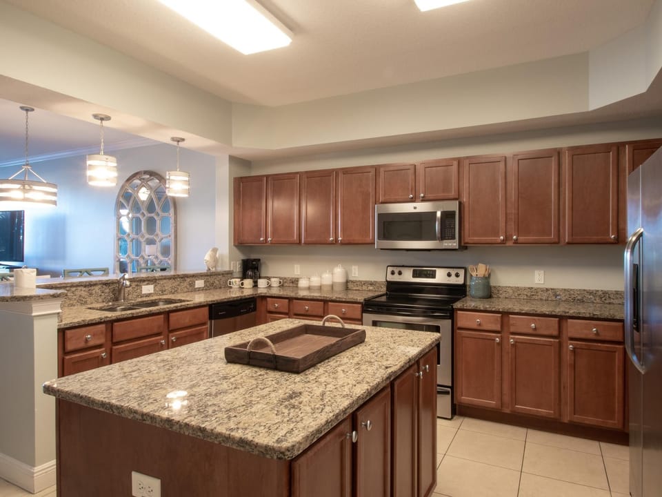 Granite counter tops in this fully equipped kitchen
