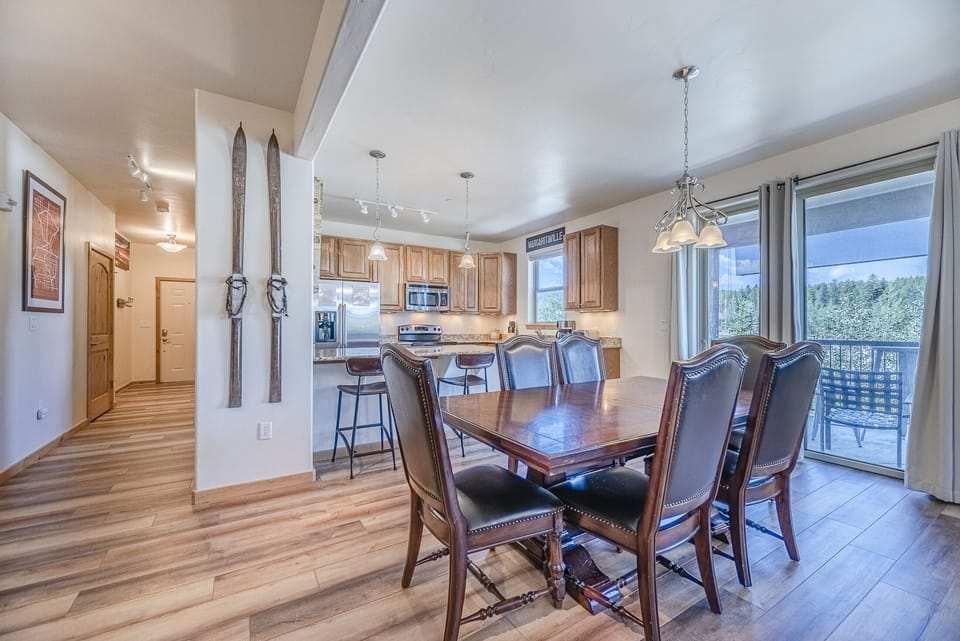 Dining Area - Also offers access to the private balcony.