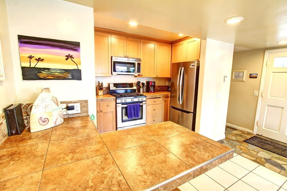 Stainless steel dishwasher and refrigerator in the kitchen