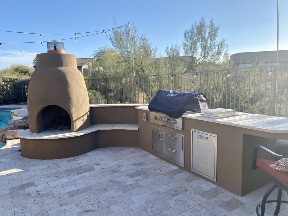 Entertaining is easy with new kiva fireplace and huge gas grill