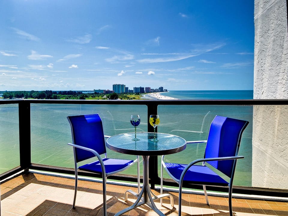 Florida Beach Rentals 440W 1108S balcony table chairs glasses