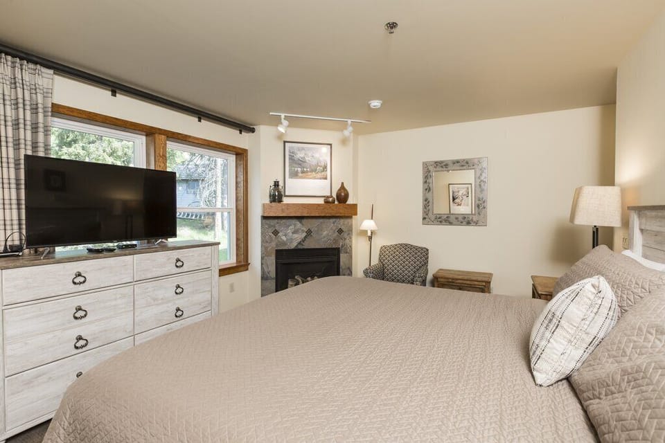 Master bedroom with gas fireplace.