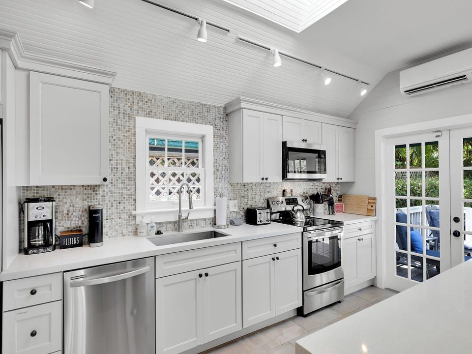 Beautiful kitchen with stainless steel appliances.